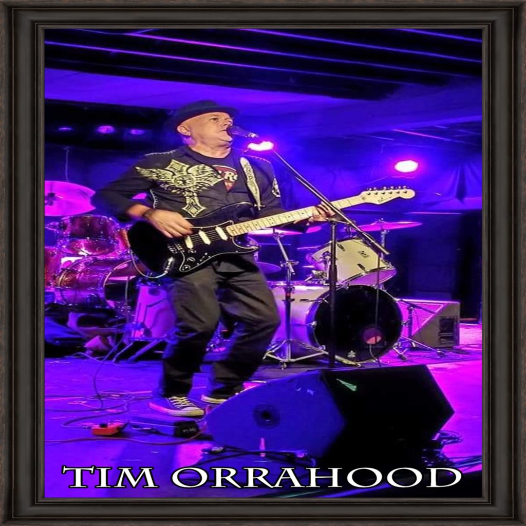 Musician Tim Orrahood performing live.